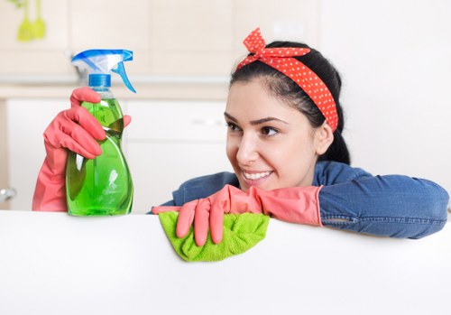 Trained carpet cleaner using safety equipment during a job
